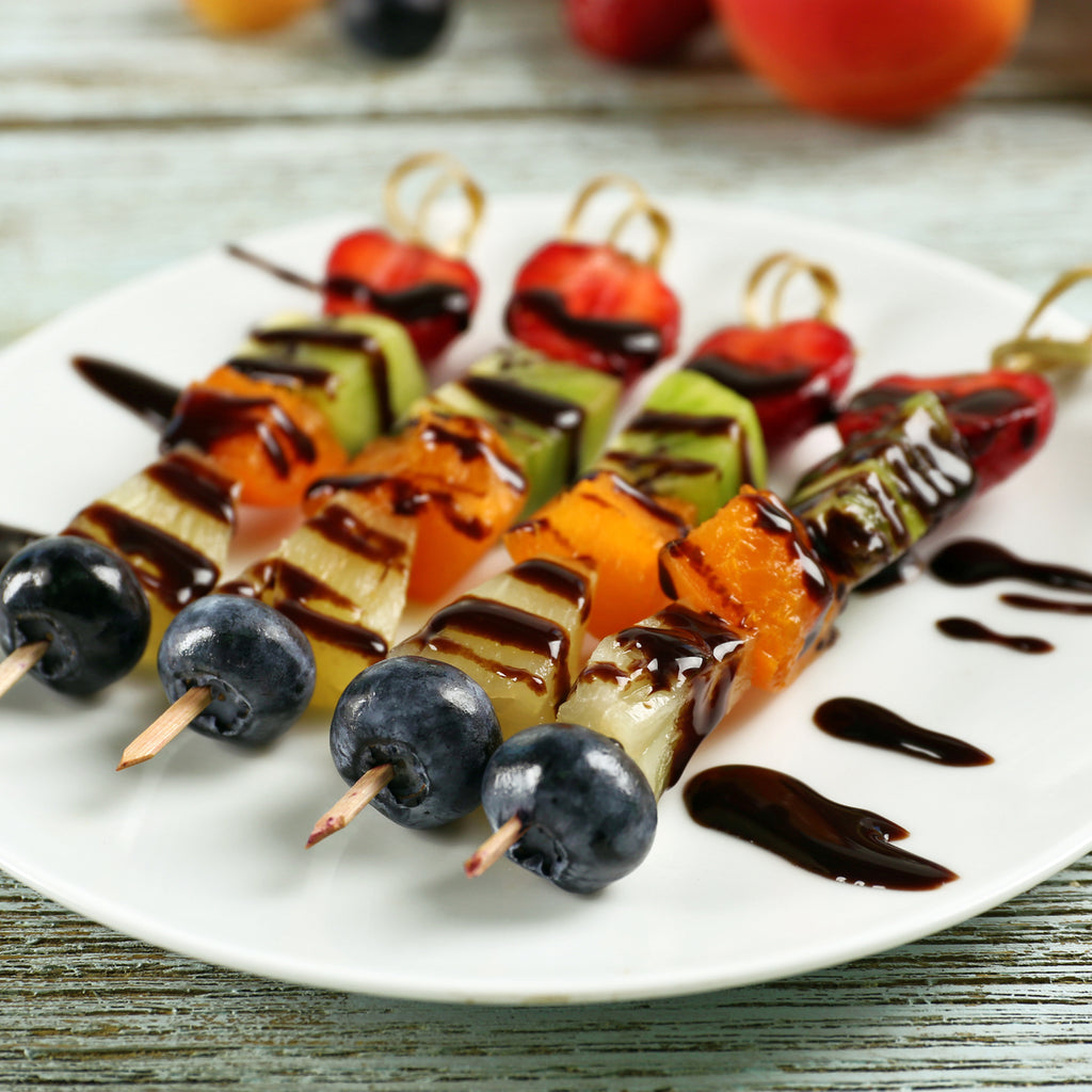 Chocolate drizzled fruit kebabs